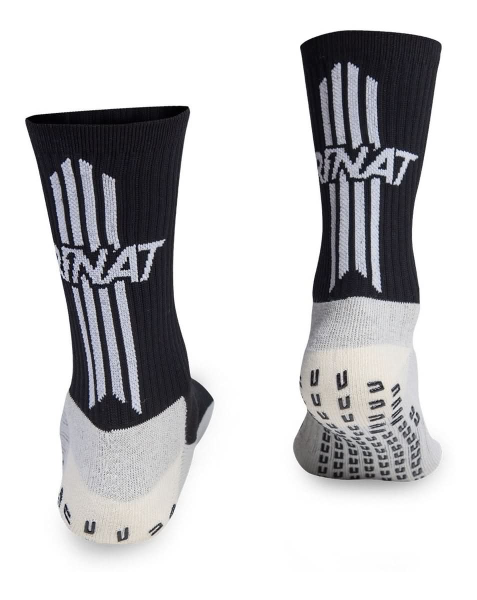 Calcetas Rinat Performance Antideslizantes negras, ajuste anatómico, material poliéster, elastano y nylon, tecnología Anti-Slip y No-Sliding, gel antideslizante en talón y planta, mejora agarre, evita deslizamientos, previene callos, incrementa estabilidad, velocidad y control, elástico en tobillo para soporte adicional, transpirables y cómodas, ideales para futbolistas y porteros en entrenamiento y partidos, unitalla 25.5-29.5 cm, diseño profesional y deportivo.